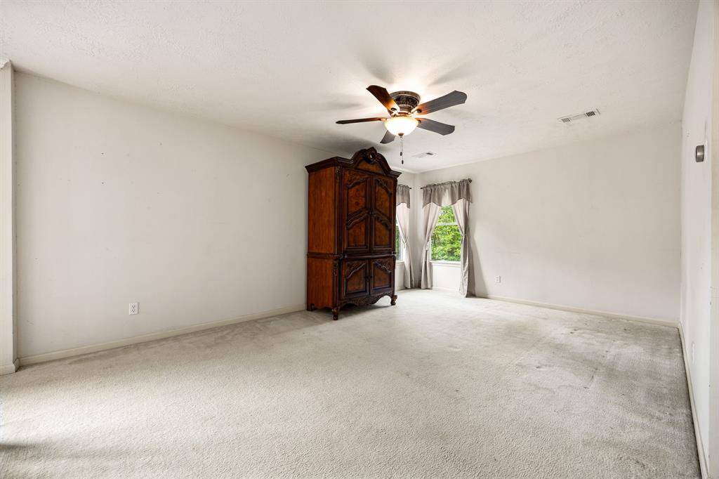 Another view of one of the secondary bedroom upstairs.