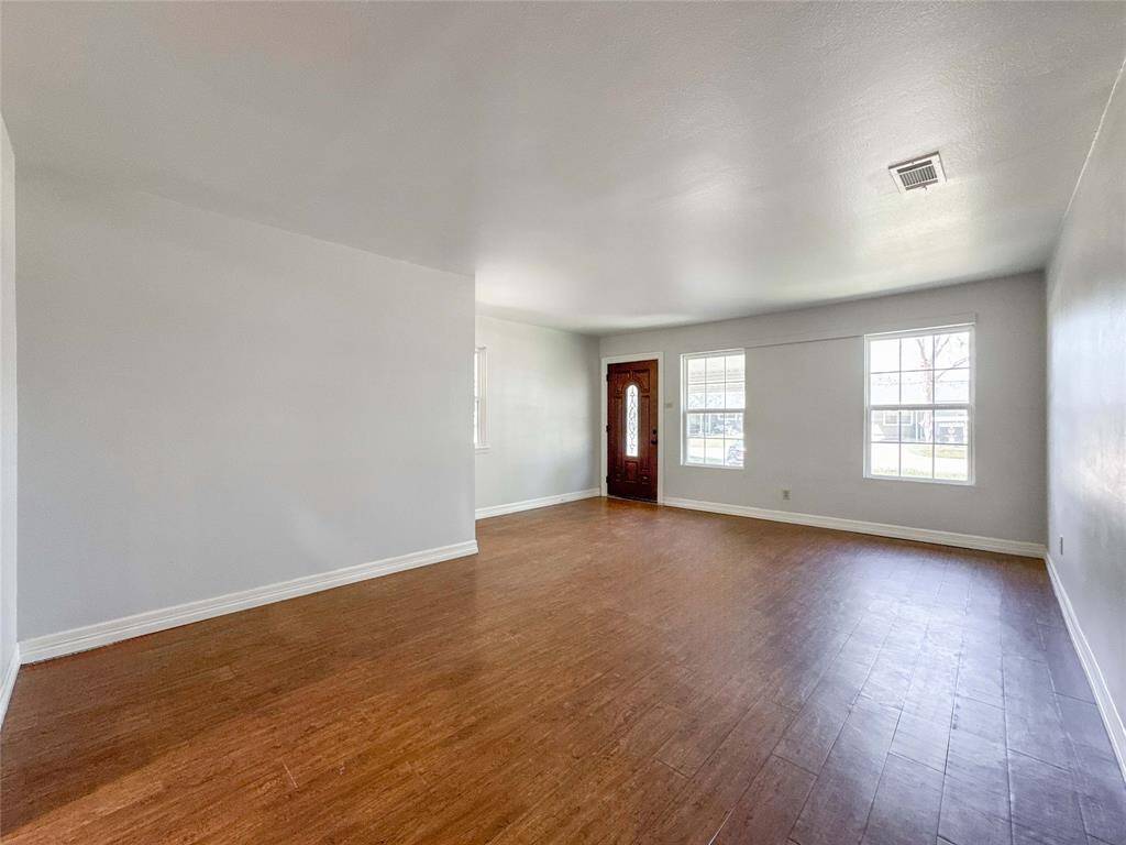 Living room area facing the front door
