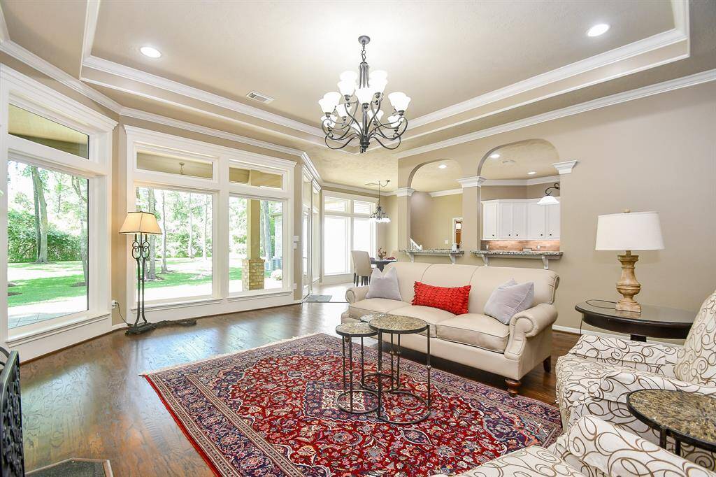 Spectacular views of the woodsy backyard and covered patio.