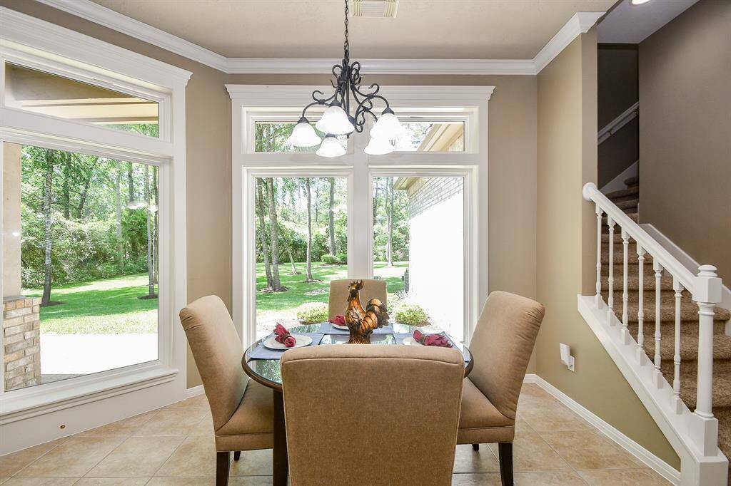 Serene and pastoral views into the backyard from the breakfast area.