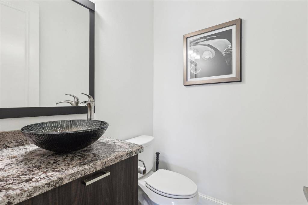 Convenient half bath located off the second-floor living room area