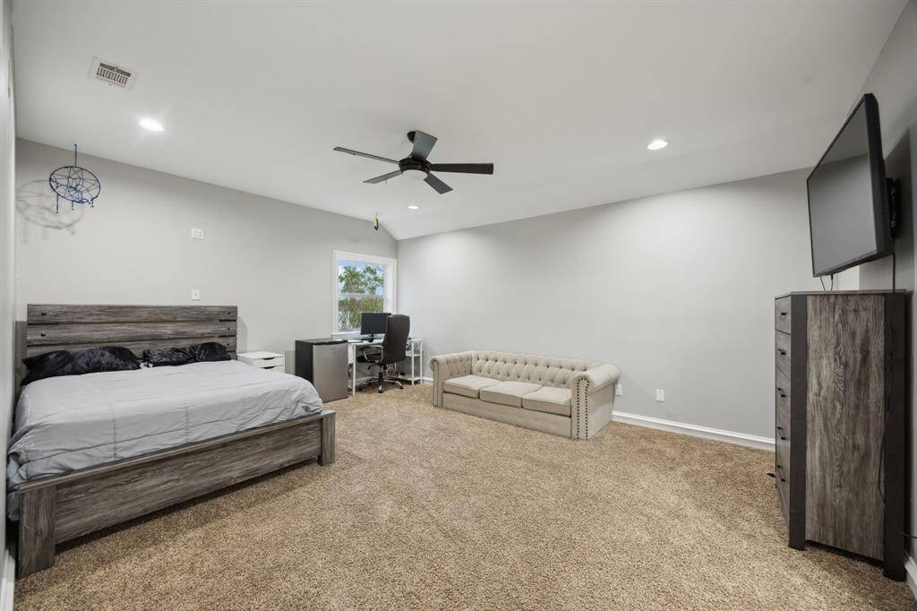 Secondary bedroom upstairs with full bathroom