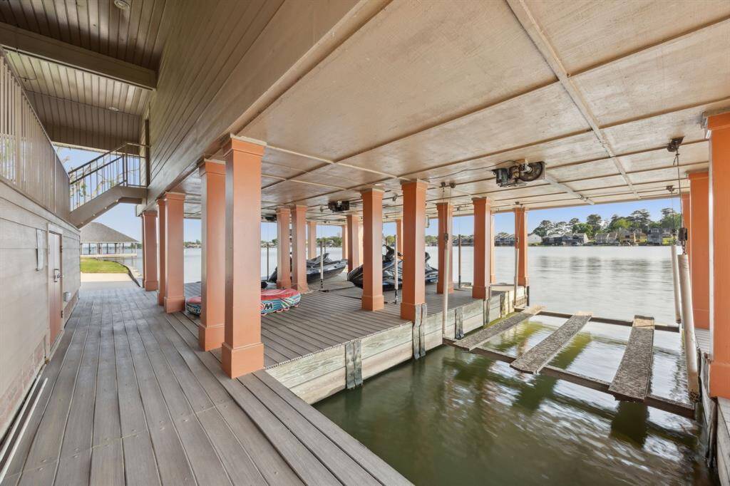 Boathouse over the water, 3 boat slips and lifts