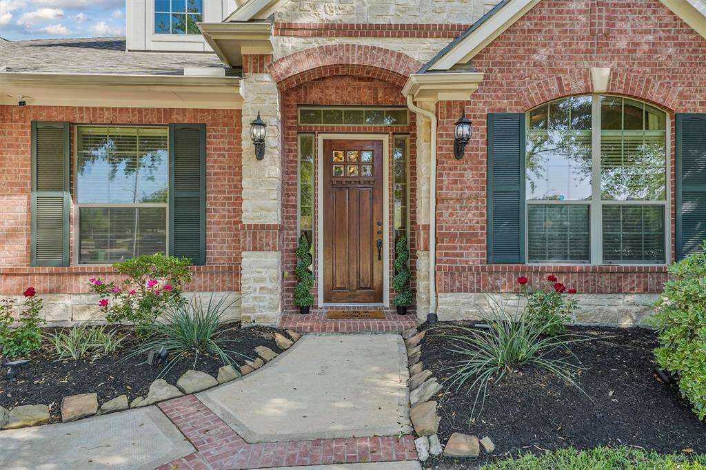 Welcome to 4002 Skipping Falls Lane, nestled in the highly sought-after community of Pine Mill Ranch. Situated on an expansive 80-foot-wide lot, the property is enhanced by mature trees and manicured landscaping, creating a peaceful and private outdoor setting.