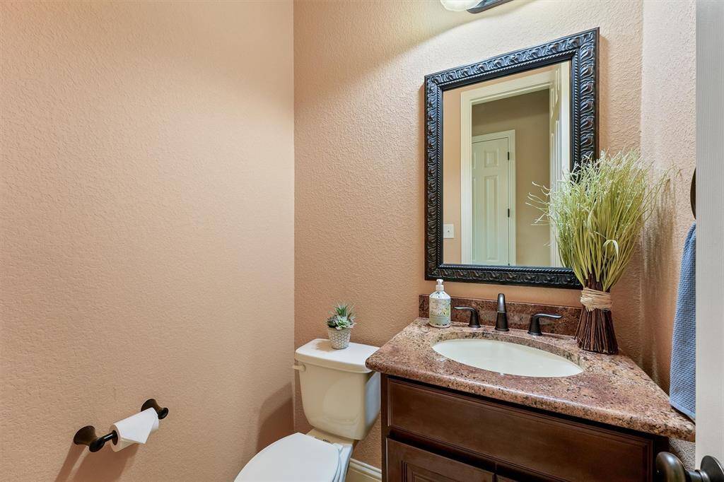 Half bath convenient for guests.