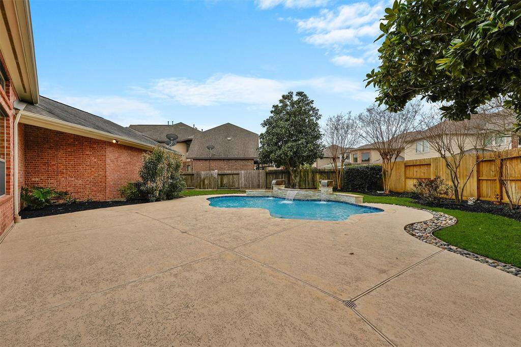 Spacious pool deck has plenty of space for additional outdoor entertaining. Equipped with mounting points for volleyball net and umbrella.