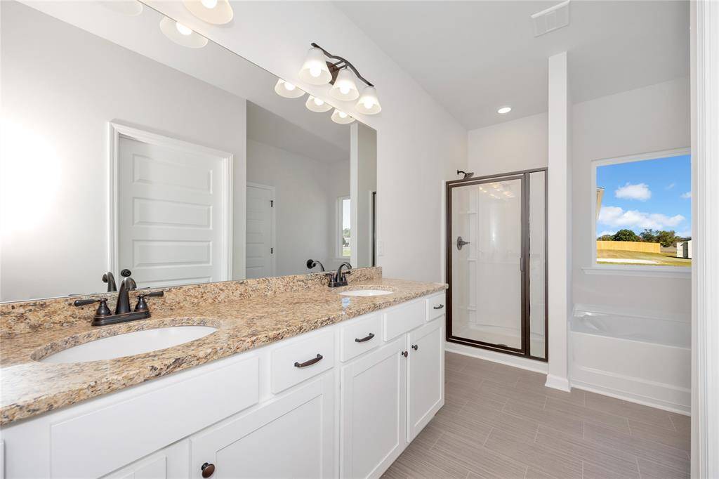 Home under construction. Sample floor plan photo used for illustrative purposes only. Upgrades, selections options, windows and colors may vary.