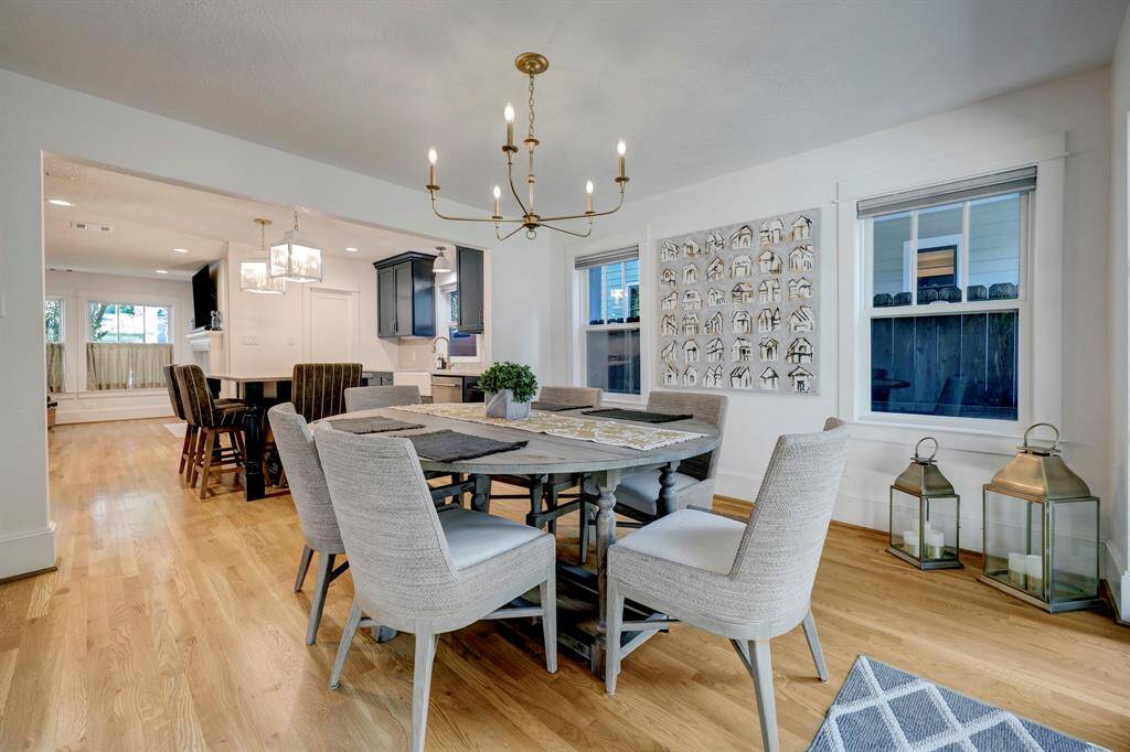 Dining room is oversized and could fit buffet or larger dining set.