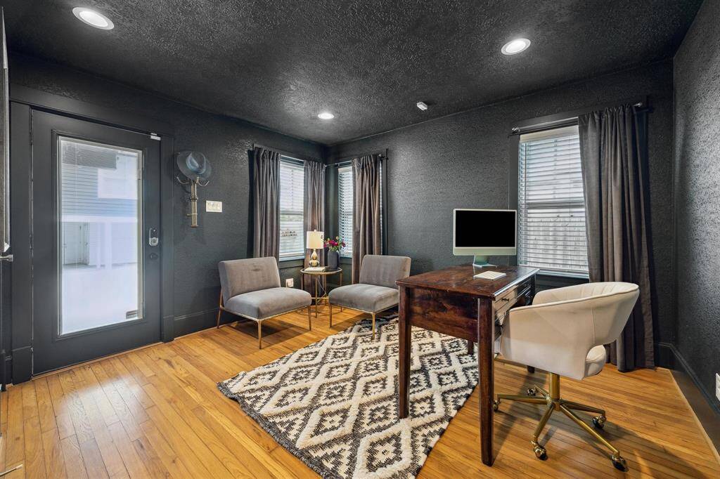 Downstairs Bedroom has seperate entry to back yard and is currently being used as a office.
