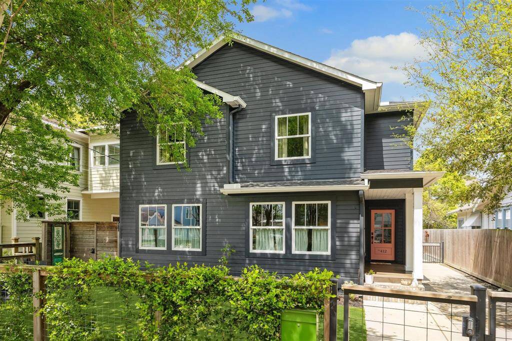 A revived and expanded 100 year old home steps from Travis elementary.