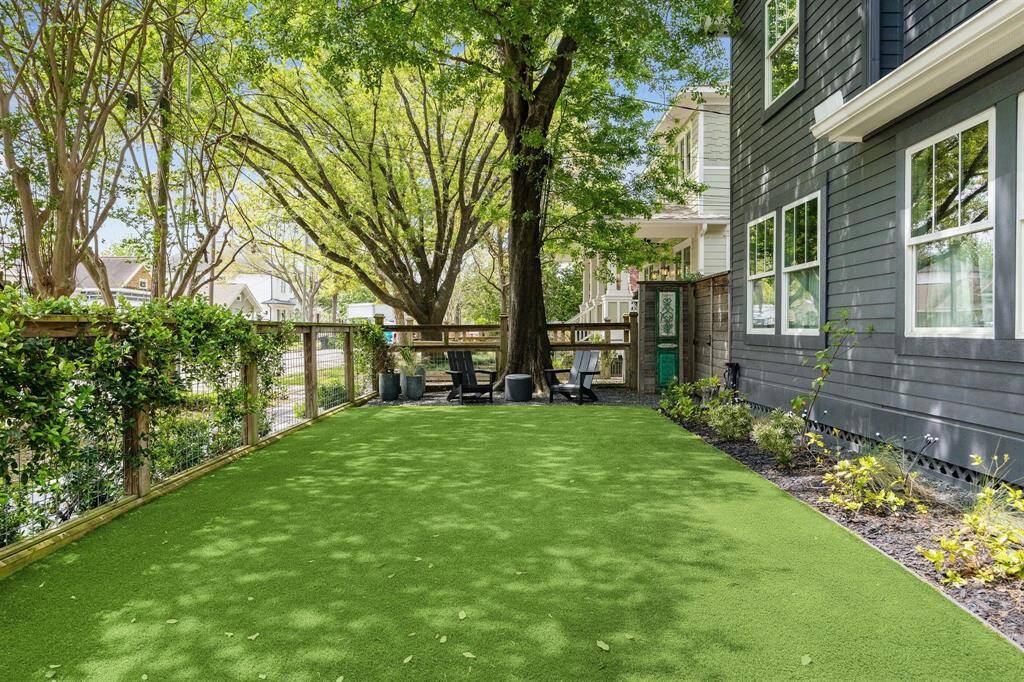 Smell the Jasmine and enjoy your neighborhood views from the front yard.