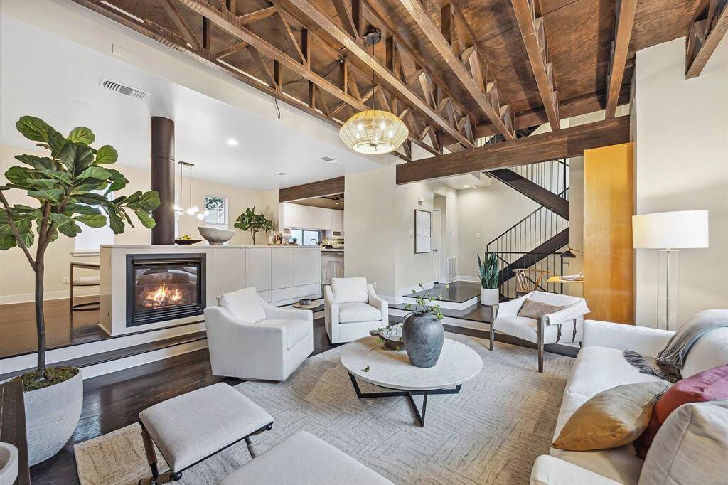 Open floor plan and high ceilings. Gas log fireplace.