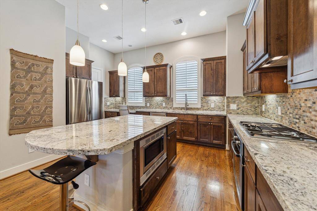 Great view of all the storage in this chef's kitchen.