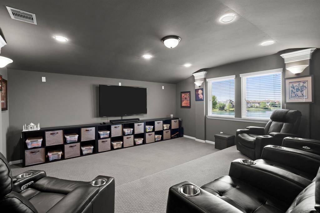 The third-floor media room adds even more entertainment options for your family.