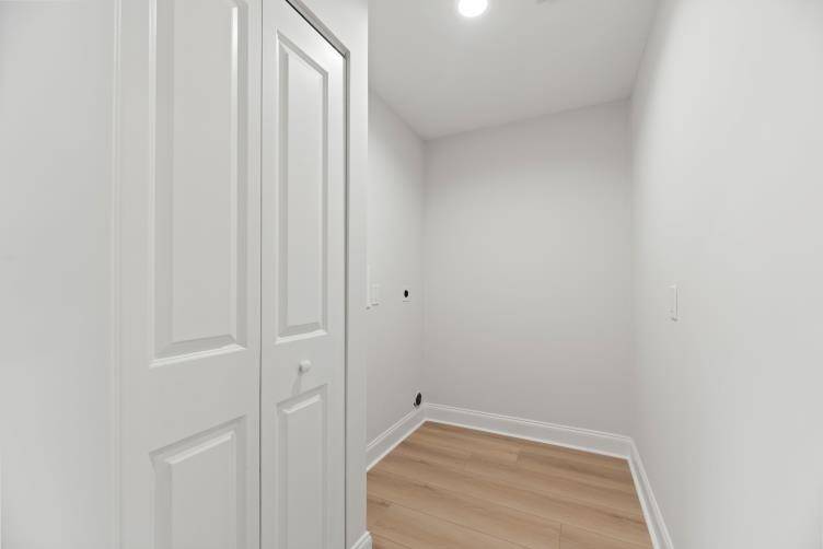 Utility room with new tankless water heater.