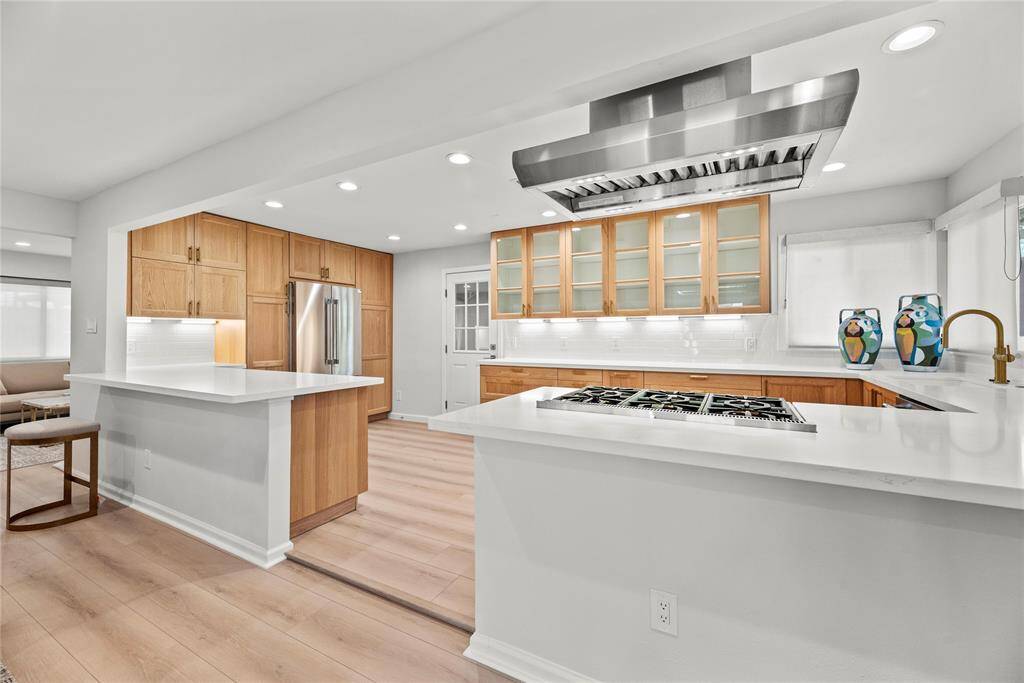 Kitchen was opened to create seamless flow.