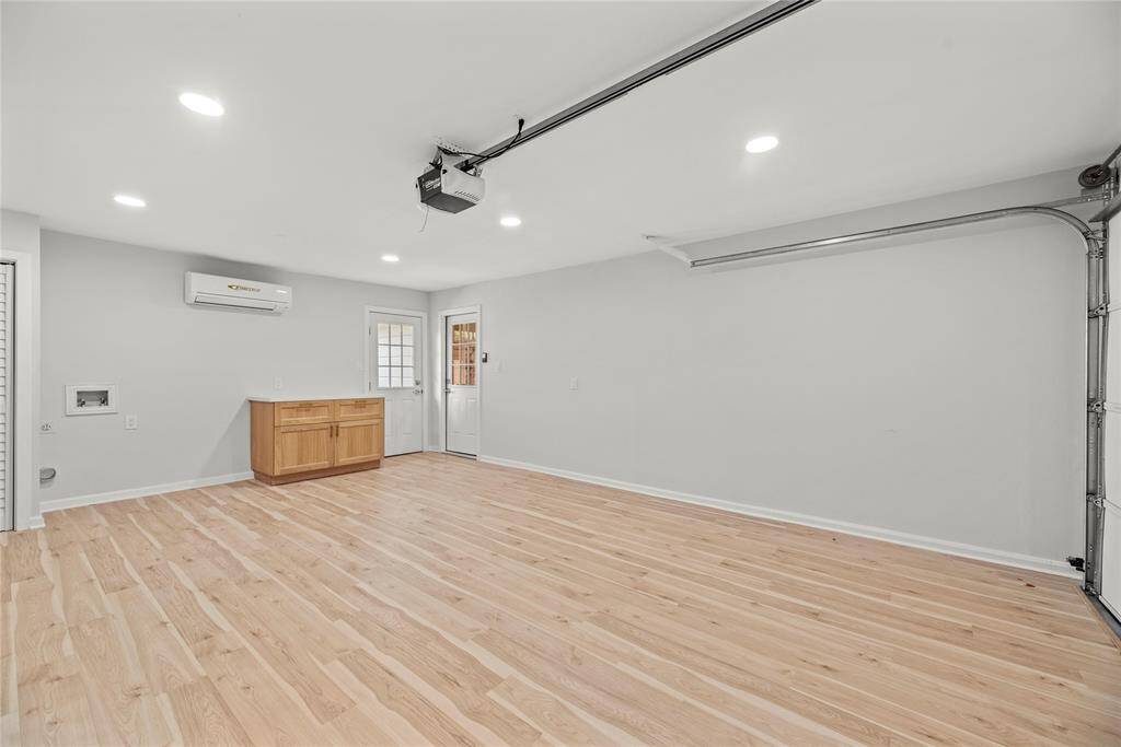 Bonus room/Garage has mini split. The space can be used as garage, game room, gym or entertaining space. The possibilities are endless.