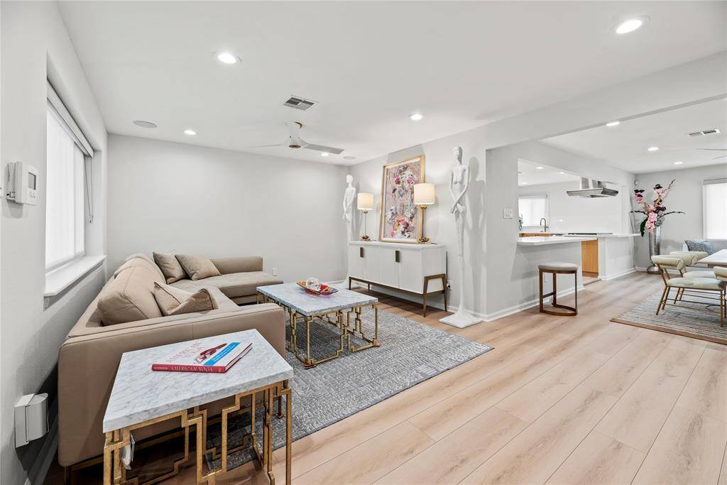 Open layout creates a seamless flow between living and dining.