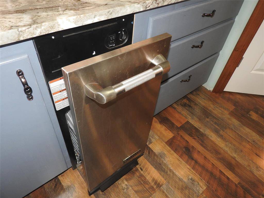 Trash Compactor....if you never had one, you will never go back to not having one.