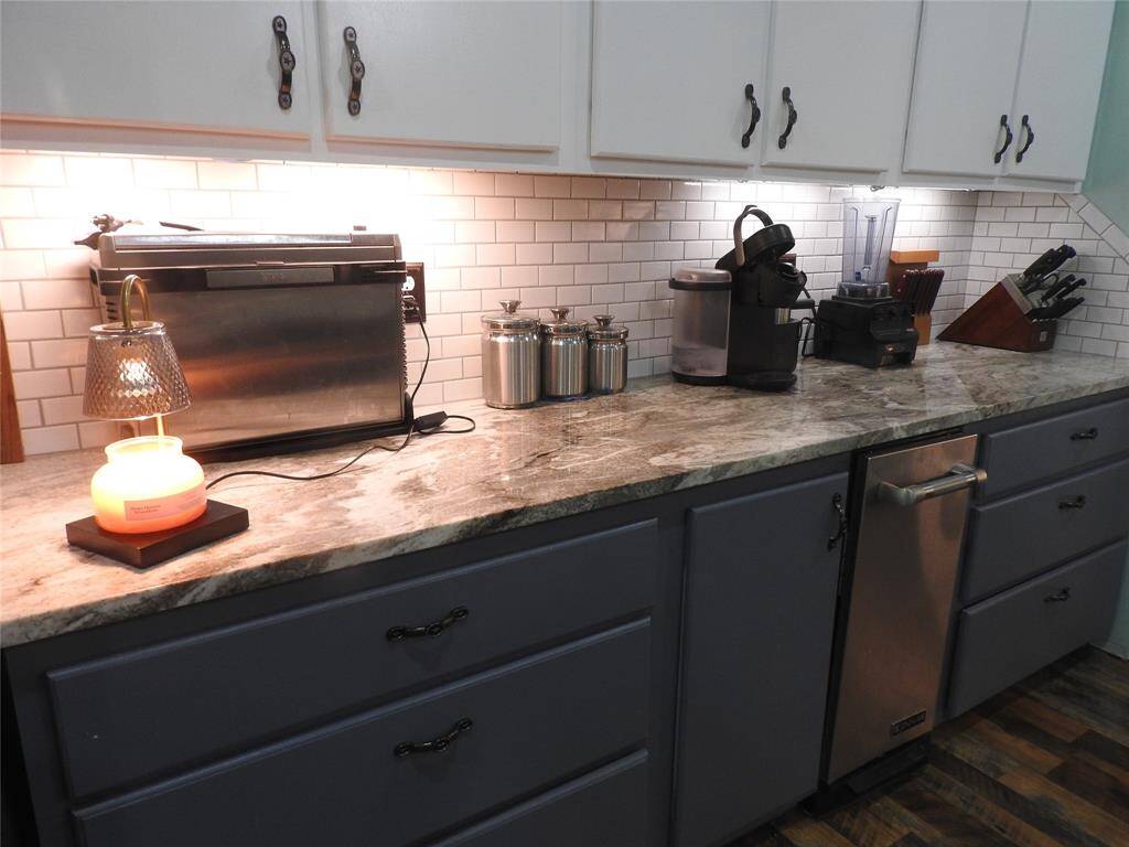 This one side of the Food Pantry. Resessive Lighting above each counter. Lots of pull out drawers for pots and pans.