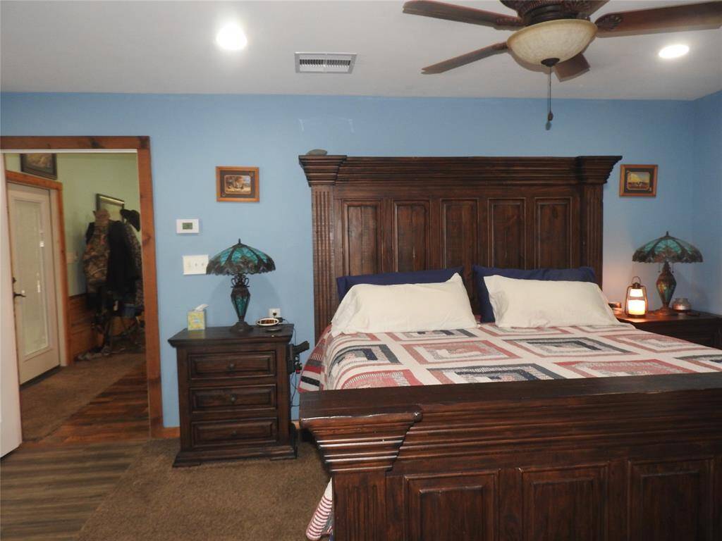 One door in the room leads to the Open Concept as the other door leads to the Bathroom.