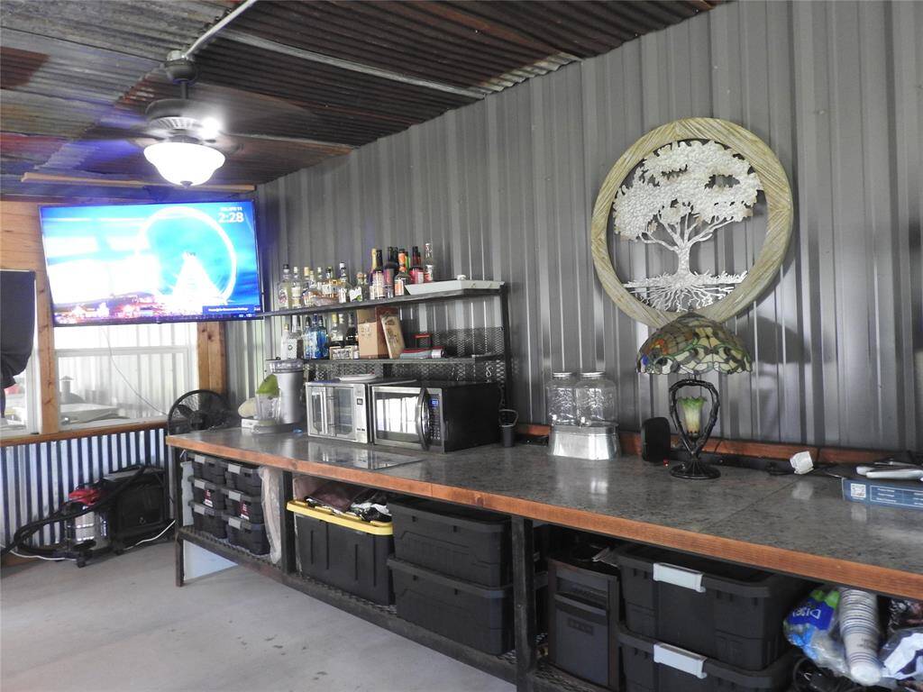 The long counter/bench area used as a bar, storage and what you could find to serve best for you. Again, completely enclosed from the outdoor weather.
