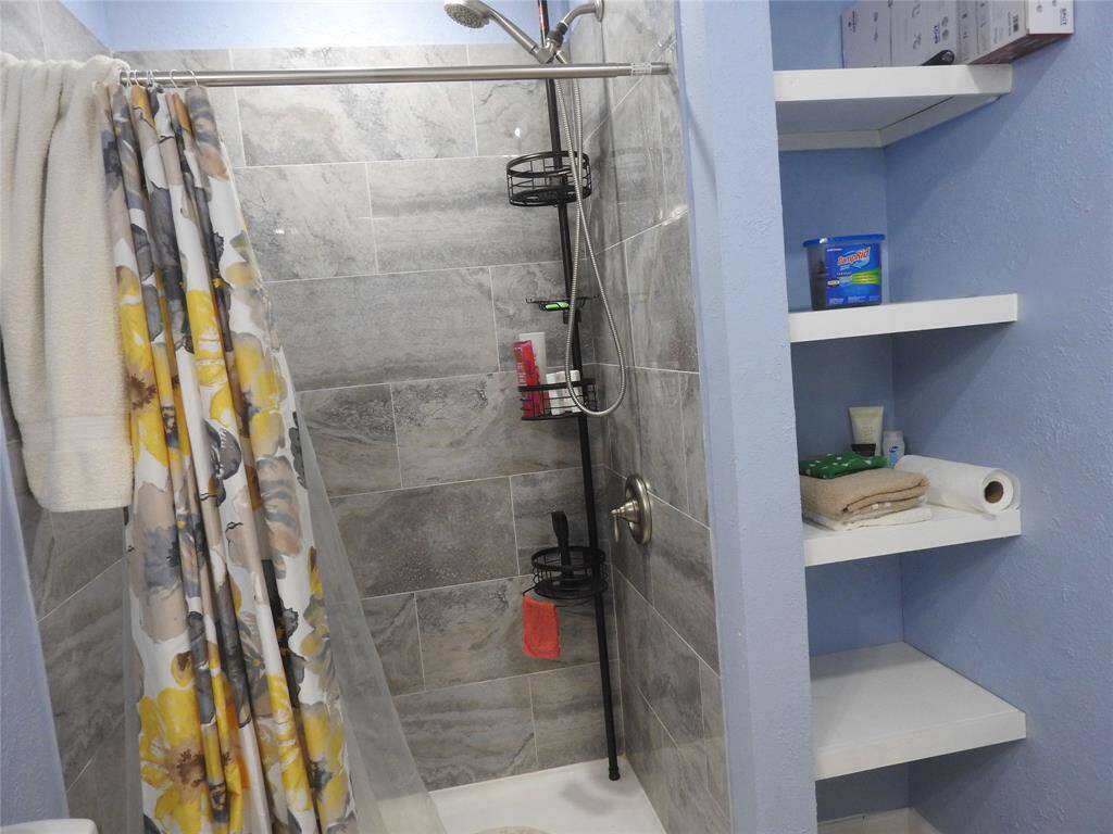 Shower and Shelving.