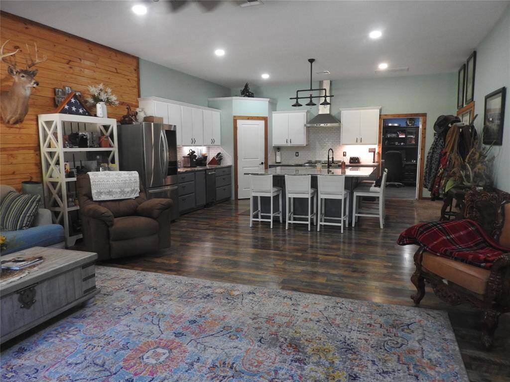 Every bit of this home was designed and built by the home owner. This is a well insullated home. This home remains cool or warm. The sun is not beating down on this home, nor the rain or hail.