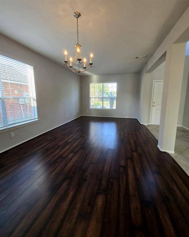 Large formal room, it can easily accomodate a dining and a seating area