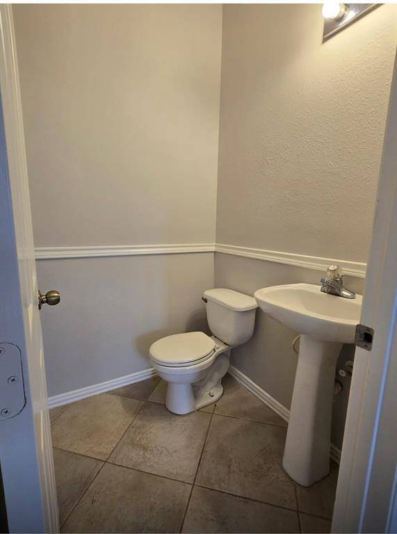 Powder room located downstairs