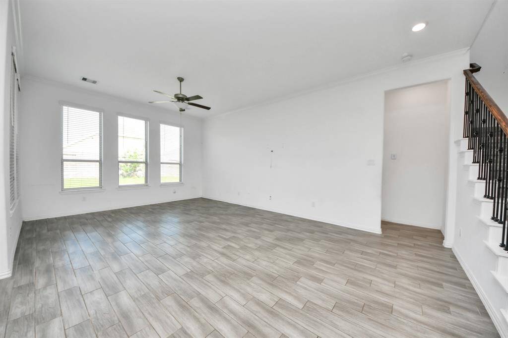 Whether you're relaxing with family or entertaining a crowd, this combined space is designed for comfort, connection, and effortless living.