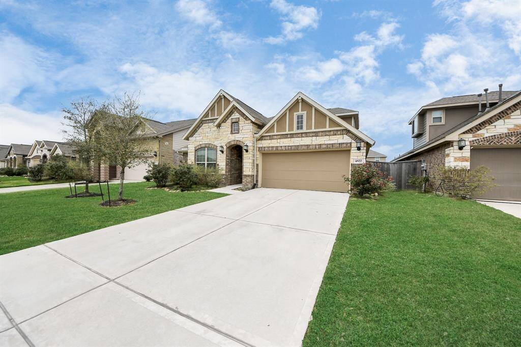 Whether you're pulling into the driveway or greeting guests at the front door, the exterior of this home sets the tone for the style and quality found throughout.