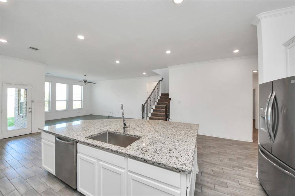 Whether you're preparing a family dinner or hosting a celebration, this kitchen is equipped to handle it all with ease.