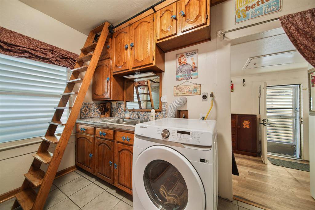Bathroom 2 - a custom stair system that allows for left right movement and providing easy access to areas above the cabinets for retrieving items as needed