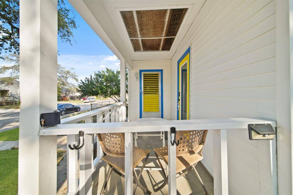 The porch has two doors. The door on the right lets a short term tenant into their own room, bedroom, and bathroom.