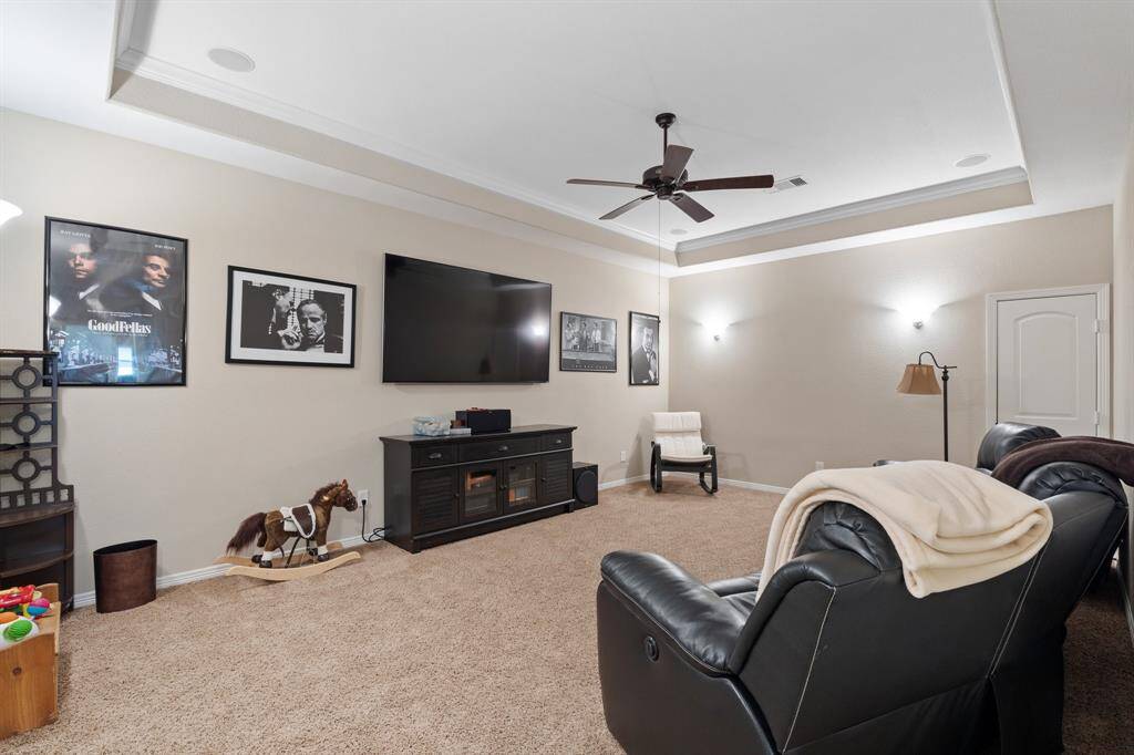 Dedicated media room is designed for the ultimate viewing experience, featuring theater-style lighting that sets the perfect ambiance for movie nights. Whether you're hosting a movie marathon or enjoying a quiet night in, this space offers the perfect setting for relaxation and entertainment.