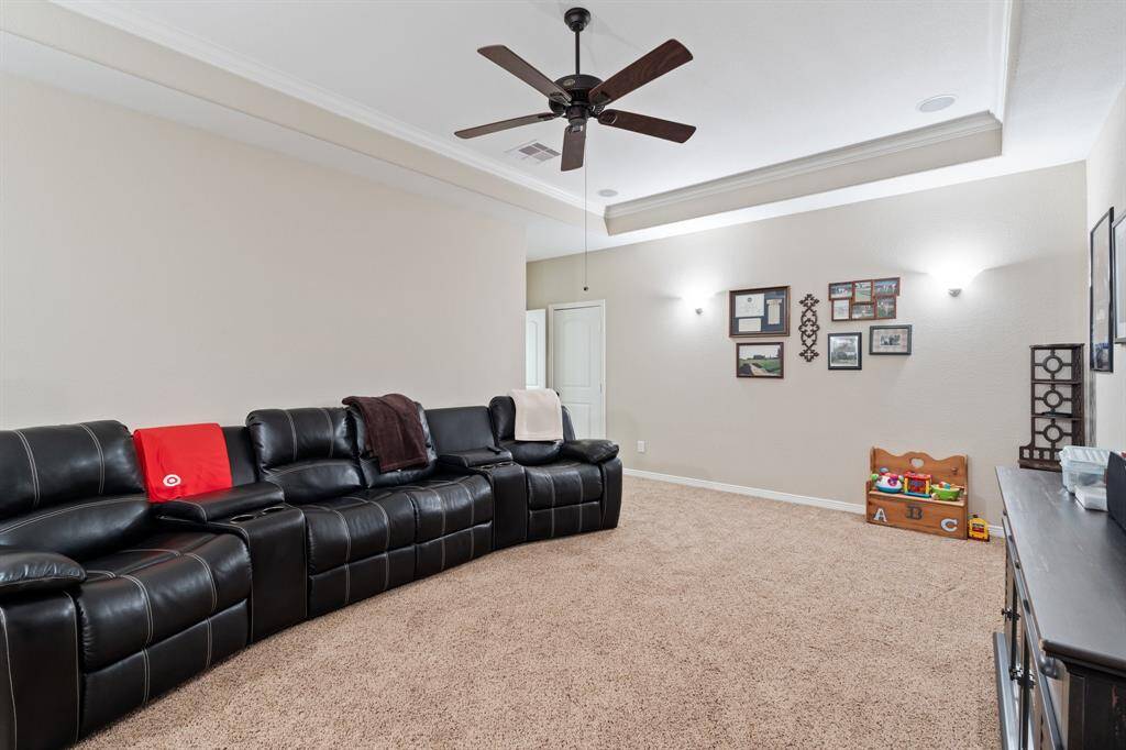 This media room is truly built for comfort and style, offering a premium space for movie lovers. With its theater-style lighting and cozy atmosphere, it’s ideal for both lively gatherings and intimate screenings.