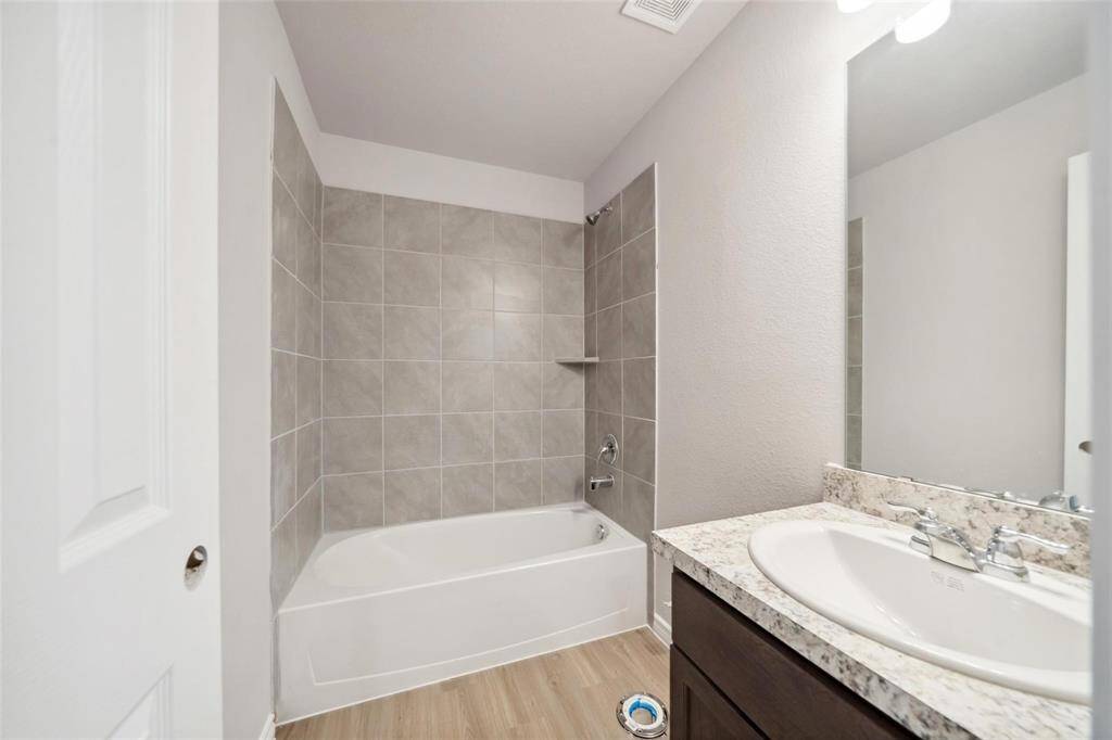 The primary suite boasts an abundance of space and plenty of natural light!