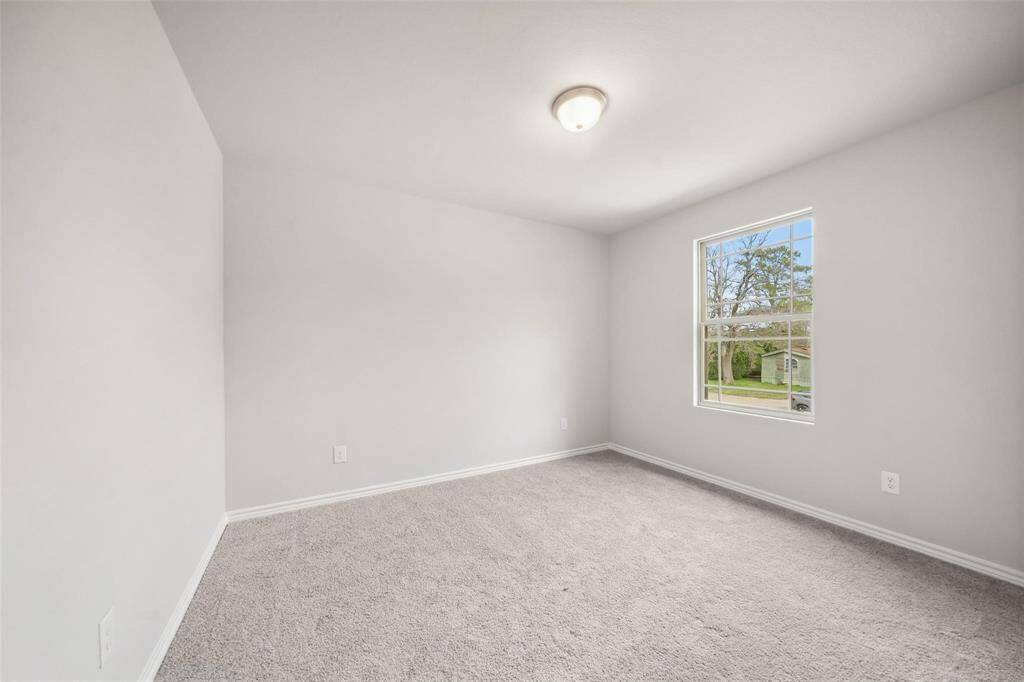 The primary bedroom features a spacious walk-in closet.