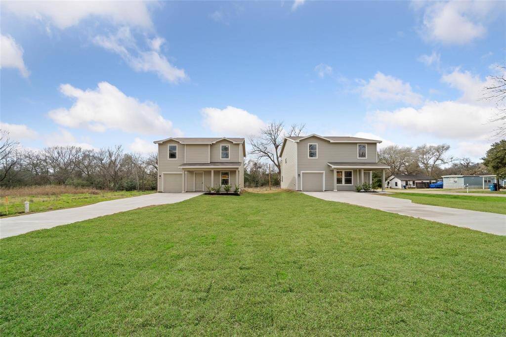 Sits on a large lot with plenty of front yard space.