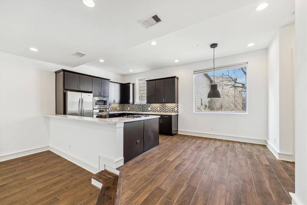 Open concept living space and kitchen.