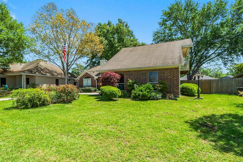 Brick home with landscaped front