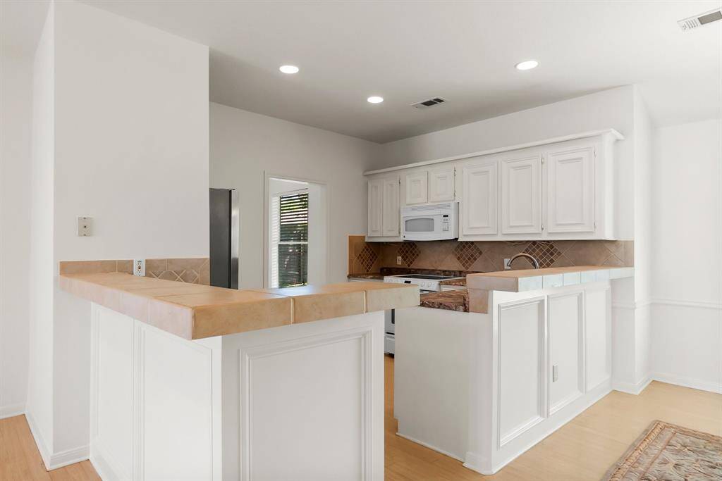 Two breakfast bars in kitchen