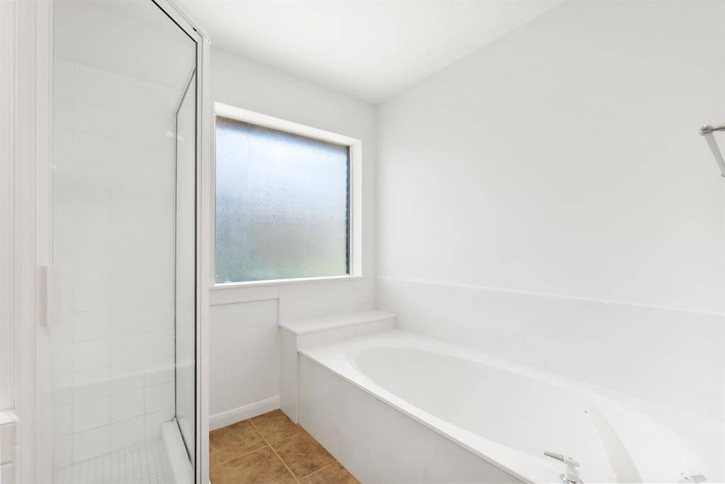 Soaking tub with natural lighting.