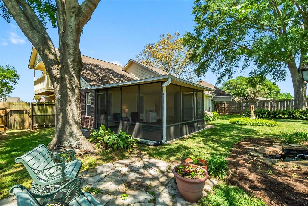 Home with spacious screened in back patio