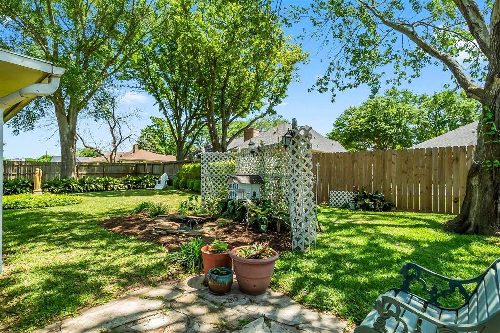 Private backyard and shade trees