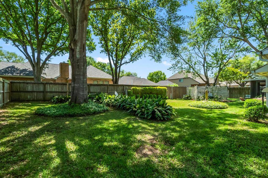 Nicely landscaped and St. Augustine grass