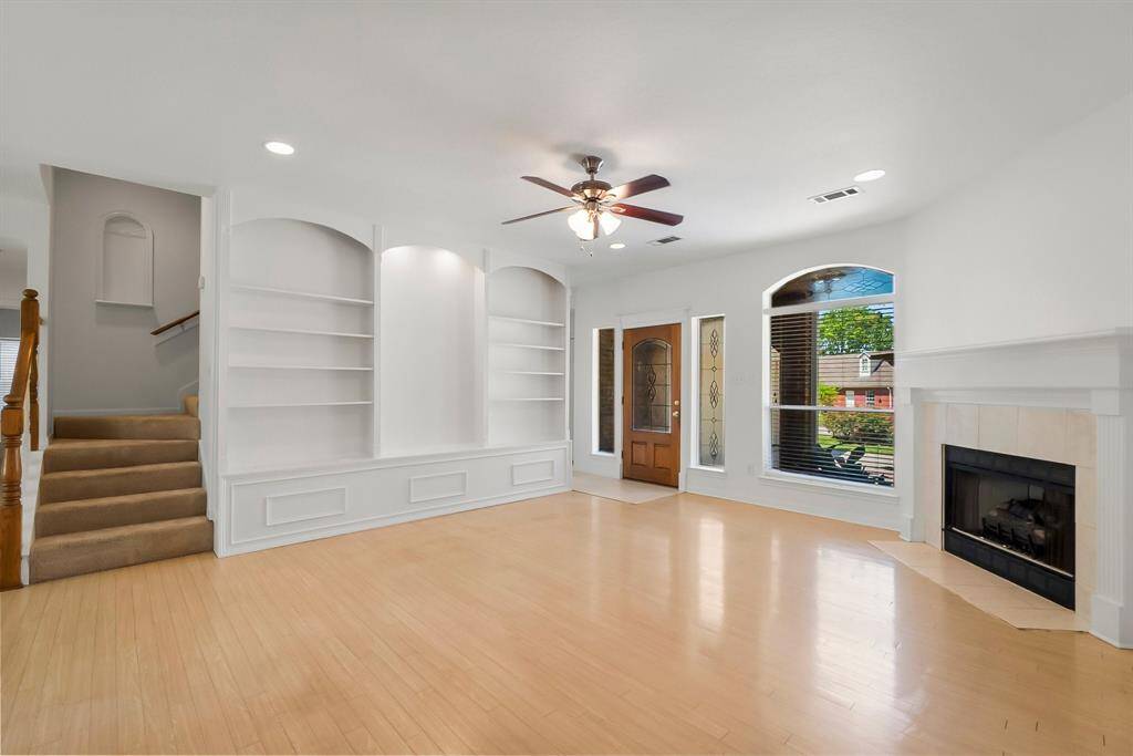 Open living area with gas log fireplace
