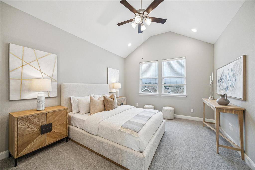 On the third floor you will find the primary bedroom with vaulted ceilings and soaked in natural light.