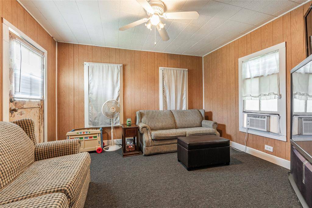 Good size family room with lots of windows and window unit for the summer months.